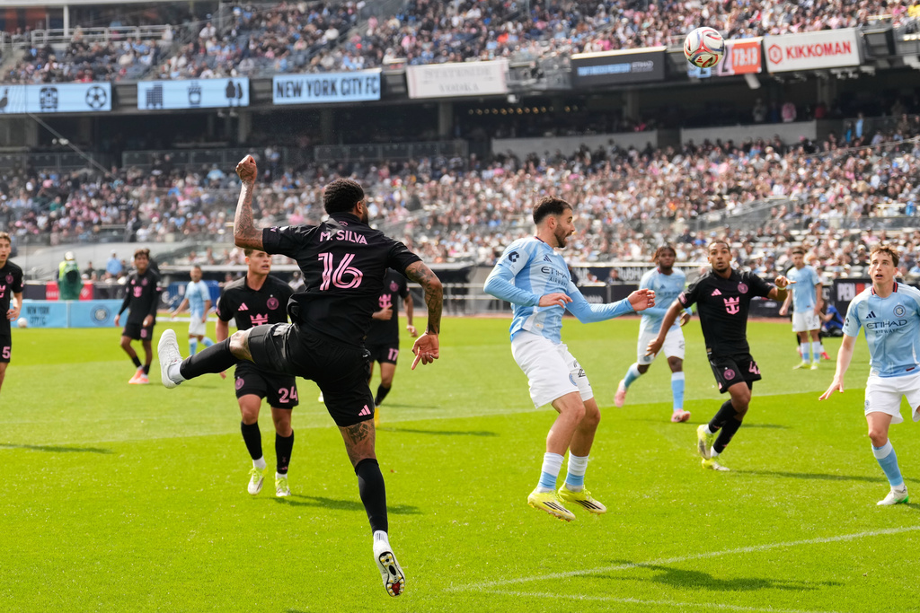 Inter Miami's Micael dos Santos Silva (16), left, scores on a header during the second half of an MLS soccer game against New York City FC at Yankee Stadium in New York, Sunday, March 22, 2026. (AP Photo/Seth Wenig)