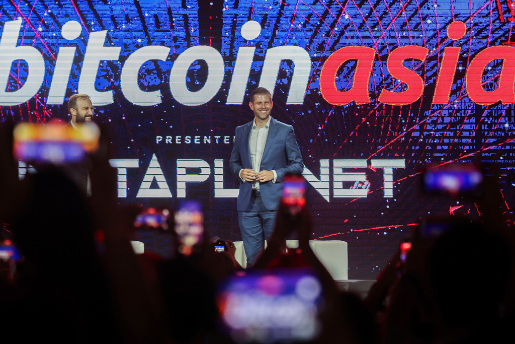FILE - Eric Trump, Executive Vice President of the Trump Organization reacts during the Bitcoin Asia 2025, at the Hong Kong Exhibition Centre in Hong Kong, on Aug. 29, 2025. (AP Photo/Daniel Ceng, File)