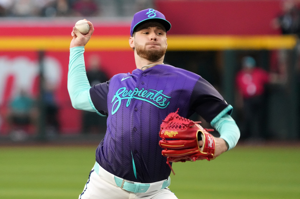 Arizona Diamondbacks pitcher Ryne Nelson throws against the New York Mets in the first inning of a baseball game, Friday, May 8, 2026, in Phoenix. (AP Photo/Rick Scuteri)