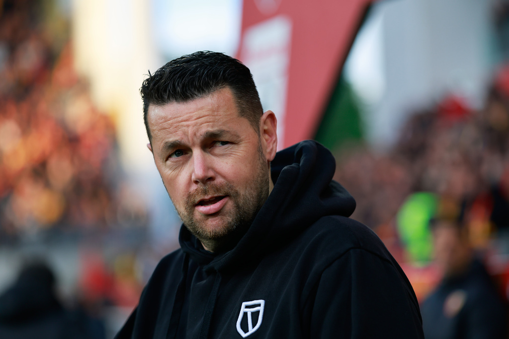 Lens' head coach Pierre Sage prior to the start of the French League One soccer match between Lens and Paris Saint Germain, in Lens, northern France, Wednesday, May 13, 2026. (AP Photo/Jean-Francois Badias)