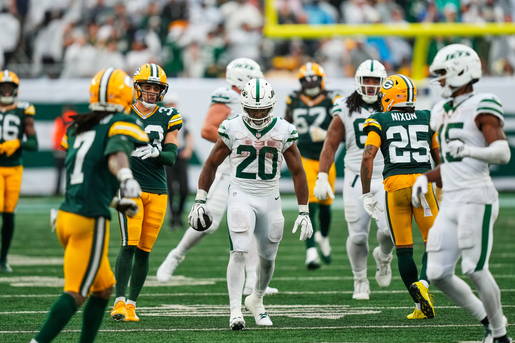 New York Jets running back Breece Hall (20) reacts during an NFL football game against the Green Bay Packers in East Rutherford, N.J., Sunday, Sept. 20, 2026. (AP Photo/Yuki Iwamura)