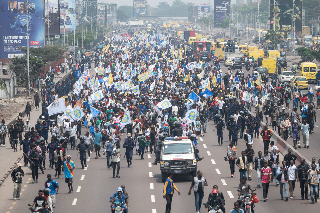 People march during a protest organized by opposition parties against constitutional changes proposed by President Felix Tshisekedi, in Kinshasa, Congo, Tuesday, Sept. 15, 2026. (AP Photo/Samy Ntumba Shambuyi)