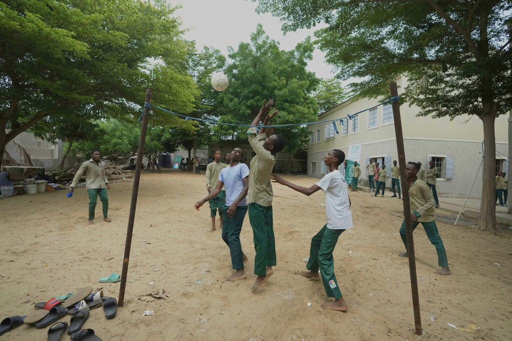 Students of the Future Prowess Islamic Foundation School play soccer during break time, in Maiduguri, Nigeria, Thursday, July 24, 2025. (AP Photo/Sunday Alamba)
