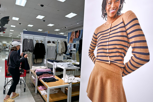 FILE - A shopper shops at a retail store in Arlington Heights, Ill., Tuesday, Sept. 23, 2025. (AP Photo/Nam Y. Huh, File) FILE - A shopper shops at a retail store in Arlington Heights, Ill., Tuesday, Sept. 23, 2025. (AP Photo/Nam Y. Huh, File)