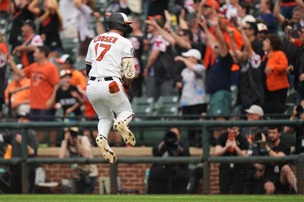 Baltimore Orioles' Colton Cowser celebrates after hitting a walkoff two-run home run during the 13th inning of a baseball game against the Tampa Bay Rays, Monday, May 25, 2026, in Baltimore. (AP Photo/Stephanie Scarbrough)