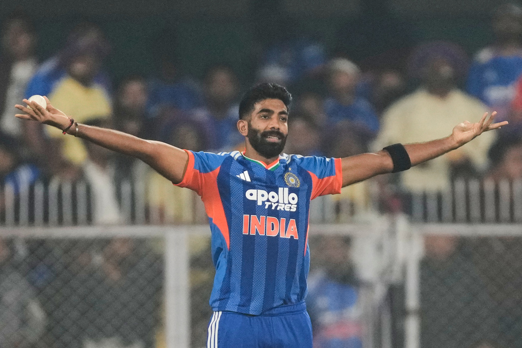India's Jasprit Bumrah celebrates the dismissal of New Zealand's captain Mitchell Santner during the third T20 cricket match between India and New Zealand in Guwahati, India, Sunday, Jan. 25, 2026. (AP Photo/Anupam Nath)