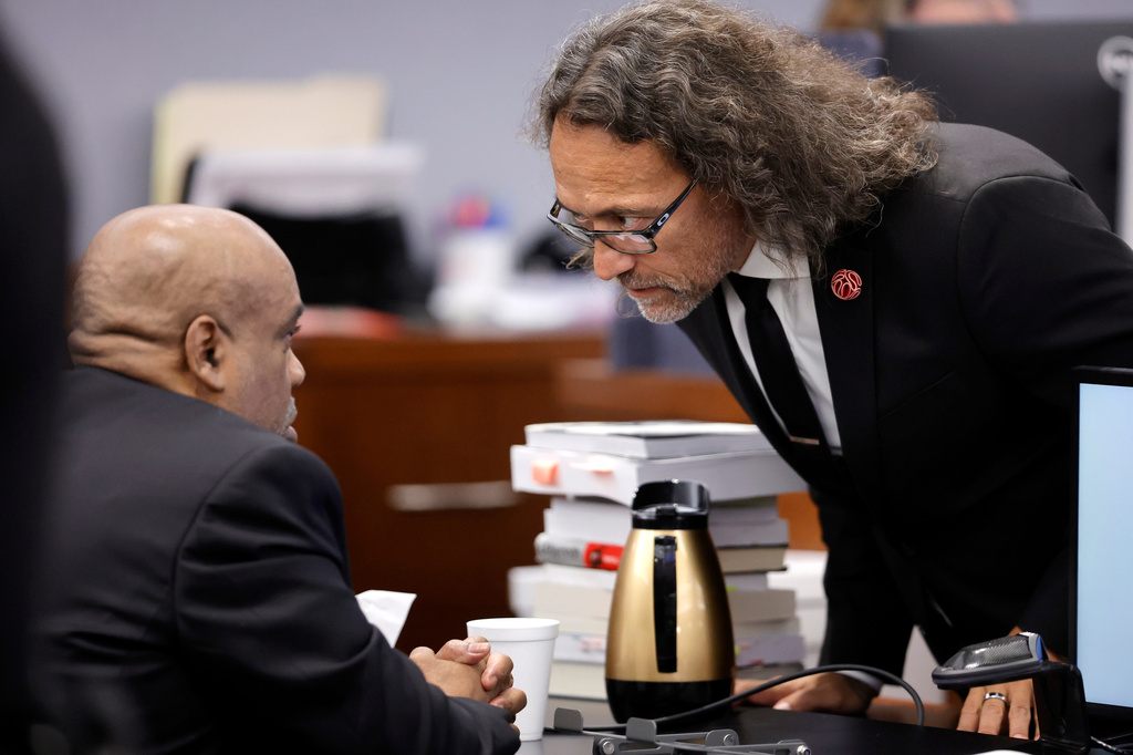 Duane Davis (L) speaks with defense attorney Michael Sanft, during closing arguments in the Duane Davis murder trial, related to the 1996 killing of rapper Tupac Shakur, in Clark County District Court at the Regional Justice Center in Las Vegas, Monday, Aug. 31, 2026. (Steve Marcus/Pool Photo via AP)