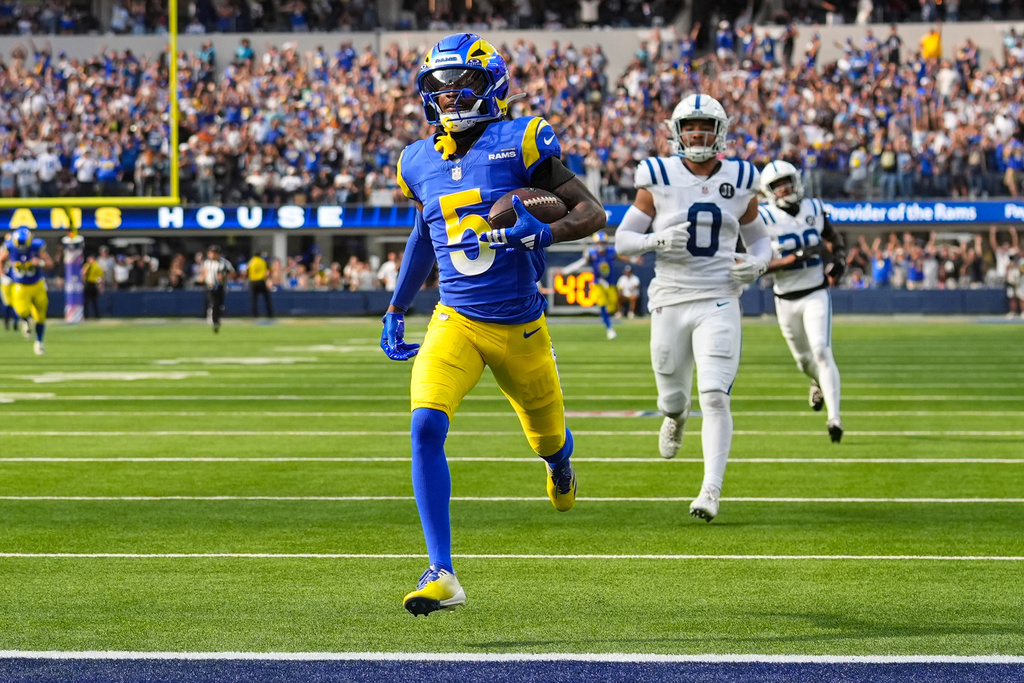 Los Angeles Rams wide receiver Tutu Atwell (5) runs in for a touchdown after a catch against the Indianapolis Colts during the second hall of an NFL football game Sunday, Sept. 28, 2025, in Inglewood, Calif. (AP Photo/Marcio Jose Sanchez)