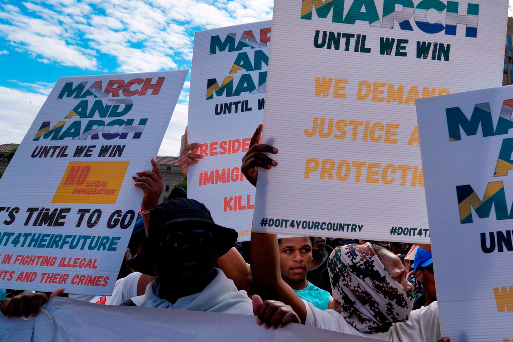South Africans protest against illegal migration, in Johannesburg, South Africa, April 29, 2026. (AP Photo/Themba Hadebe)