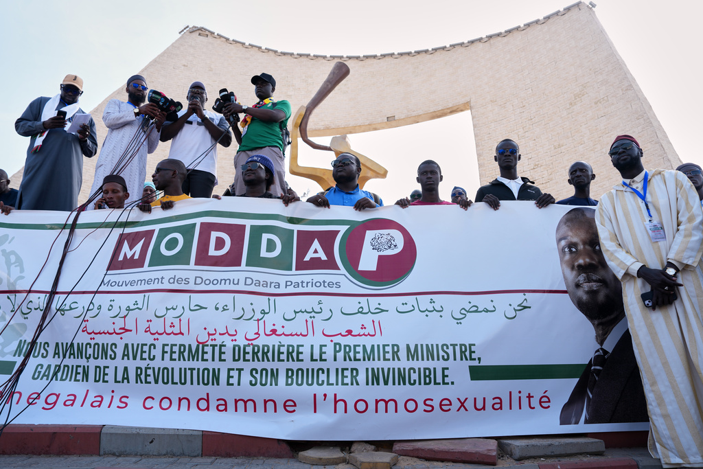 Protesters demonstrate against homosexuality in Dakar, Senegal, Friday, March 6, 2026. (AP Photo/Misper Apawu)
