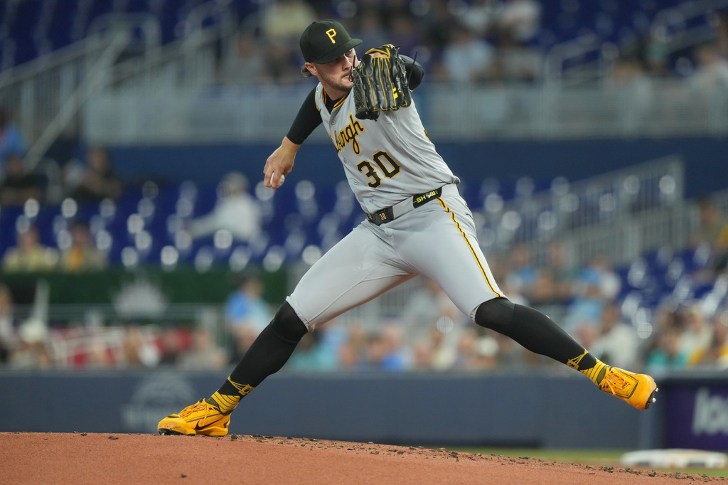 Pittsburgh Pirates starting pitcher Paul Skenes (30) aims a pitch during the first inning of a baseball game against the Miami Marlins Tuesday, Aug. 11, 2026, in Miami. (AP Photo/Marta Lavandier)