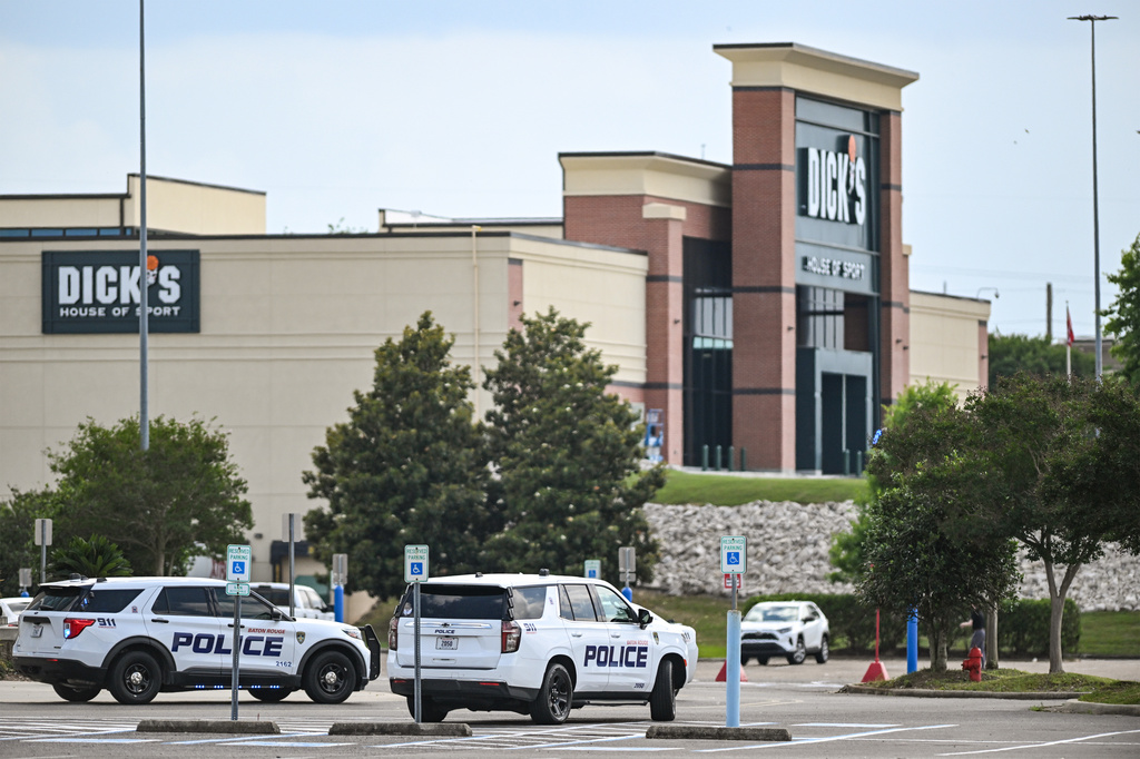 Law enforcement vehicles rare parked at the Mall of Louisiana after a shooting, Thursday, April 23, 2026, in Baton Rouge, La. (Javier Gallegos/The Advocate via AP)
