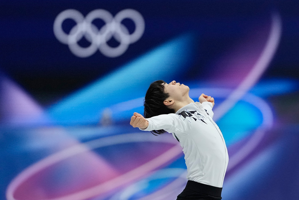 Yuma Kagiyama of Japan competes during the figure skating men's team event at the 2026 Winter Olympics, in Milan, Italy, Saturday, Feb. 7, 2026. (AP Photo/Natacha Pisarenko)
