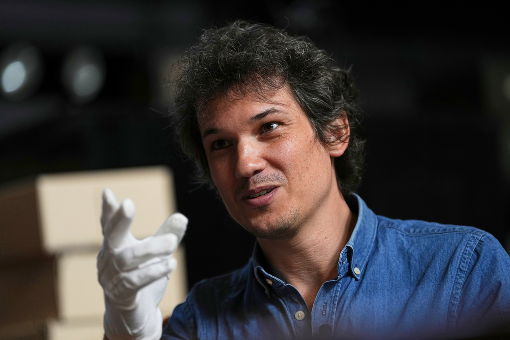 University of Pennsylvania doctoral student Marc Marin Webb speaks during an interview at the Penn Museum Archives in Philadelphia, Aug. 27, 2025. (AP Photo/Matt Rourke)