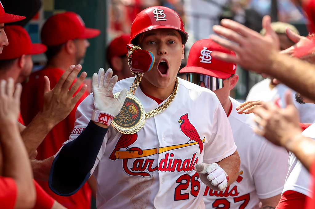 St. Louis Cardinals' JJ Wetherholt is congratulated by teammates after hitting a solo home run during the seventh inning of a baseball game against the Chicago Cubs, Thursday, July 30, 2026, in St. Louis. (AP Photo/Scott Kane)