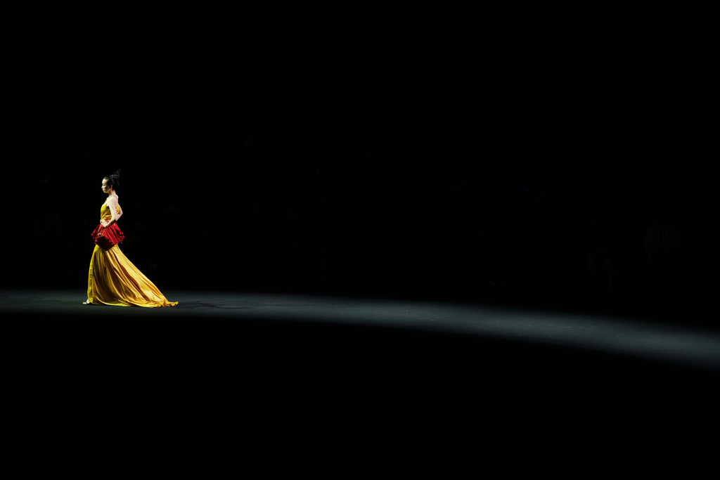 A model wears a creation by "The Urban Plette" Weaving Starry Dreams China International Children Designer Competition, during China Fashion Week (Spring) 2026 in Beijing, China, Sunday, March 22, 2026. (AP Photo/Vincent Thian)