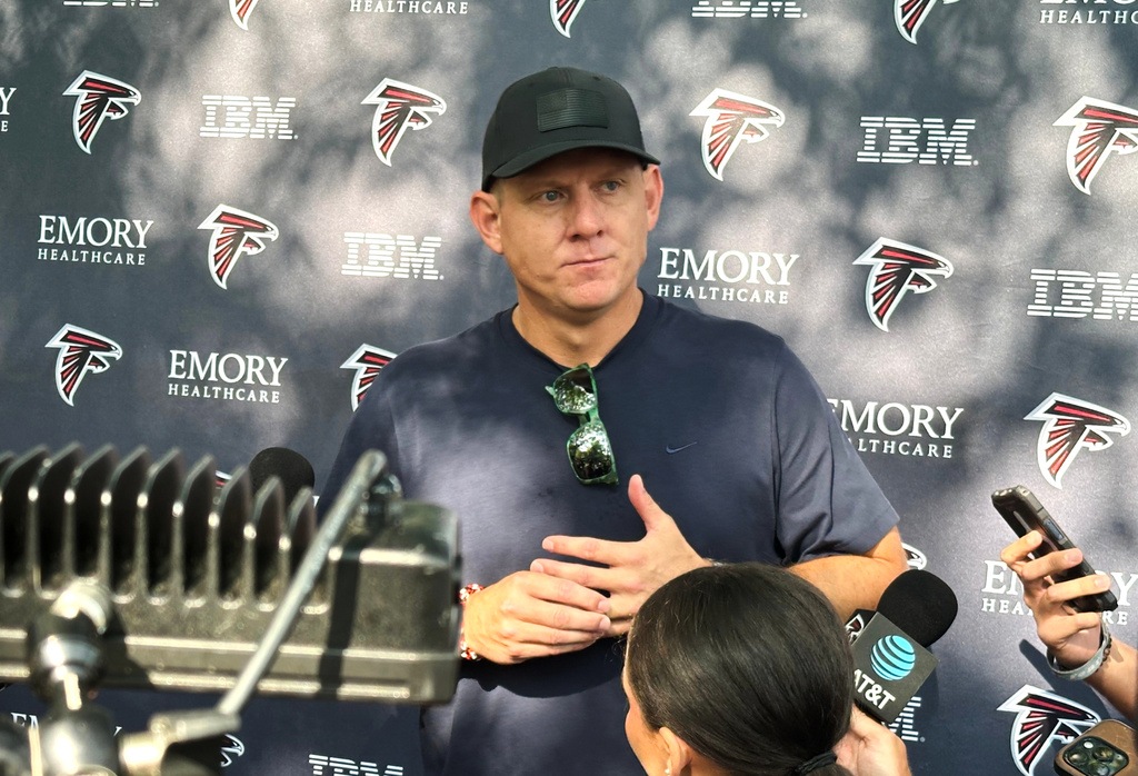Veteran kicker Nick Folk, 41, speaks with reporters at the Atlanta Falcons practice facility in Flowery Branch, Georgia, Tuesday, July 28, 2026, before the team's first practice of training camp on Wednesday. (AP Photo/Charles Odum)