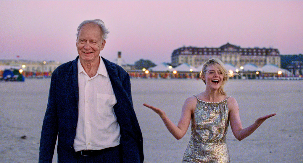This image released by Neon shows Stellan Skarsgård, left, and Elle Fanning in a scene from "Sentimental Value." (Kasper Tuxen/Neon via AP)