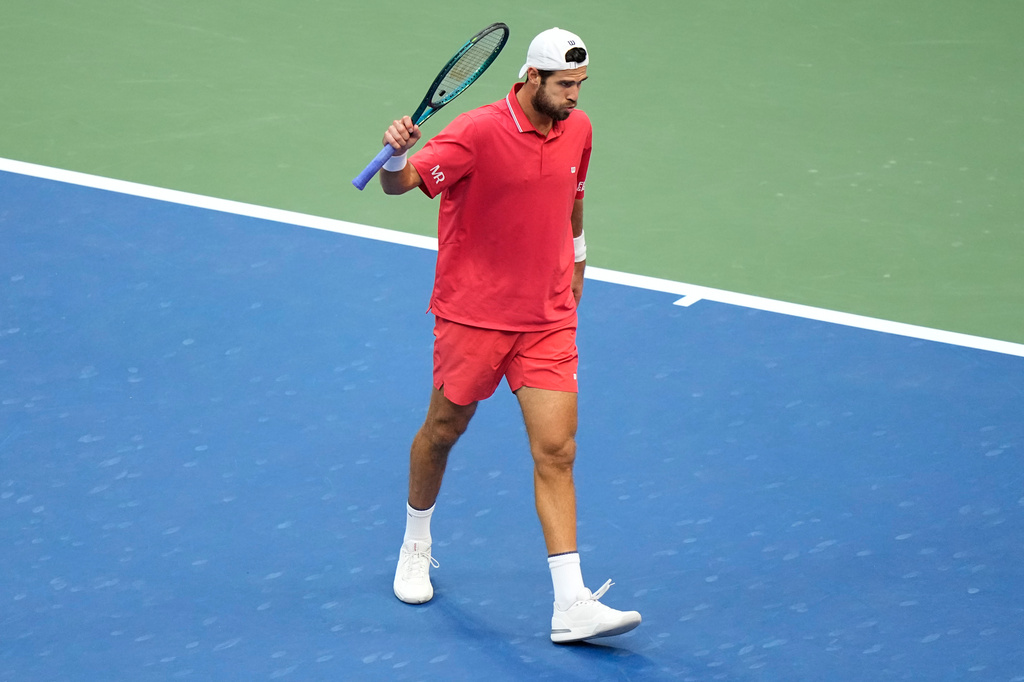 Karen Khachanov, of Russia, reacts during the men's singles semifinals of the U.S. Open tennis championships against Alexander Zverev, of Germany, Friday, Sept. 11, 2026, in New York. (AP Photo/Frank Franklin II)
