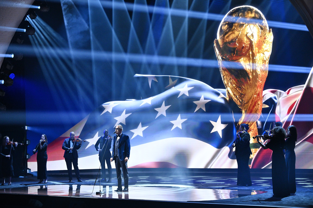 Singer Andrea Bocelli performs at the draw for the 2026 soccer World Cup at the Kennedy Center in Washington, Friday, Dec. 5, 2025. (Mandel Ngan/Pool Photo via AP)