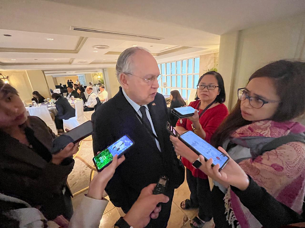 Philippine Ambassador to Washington Jose Manuel Romualdez answers questions from reporters in Manila, Philippines on Tuesday Feb. 10, 2026. (AP Photo/Jim Gomez)