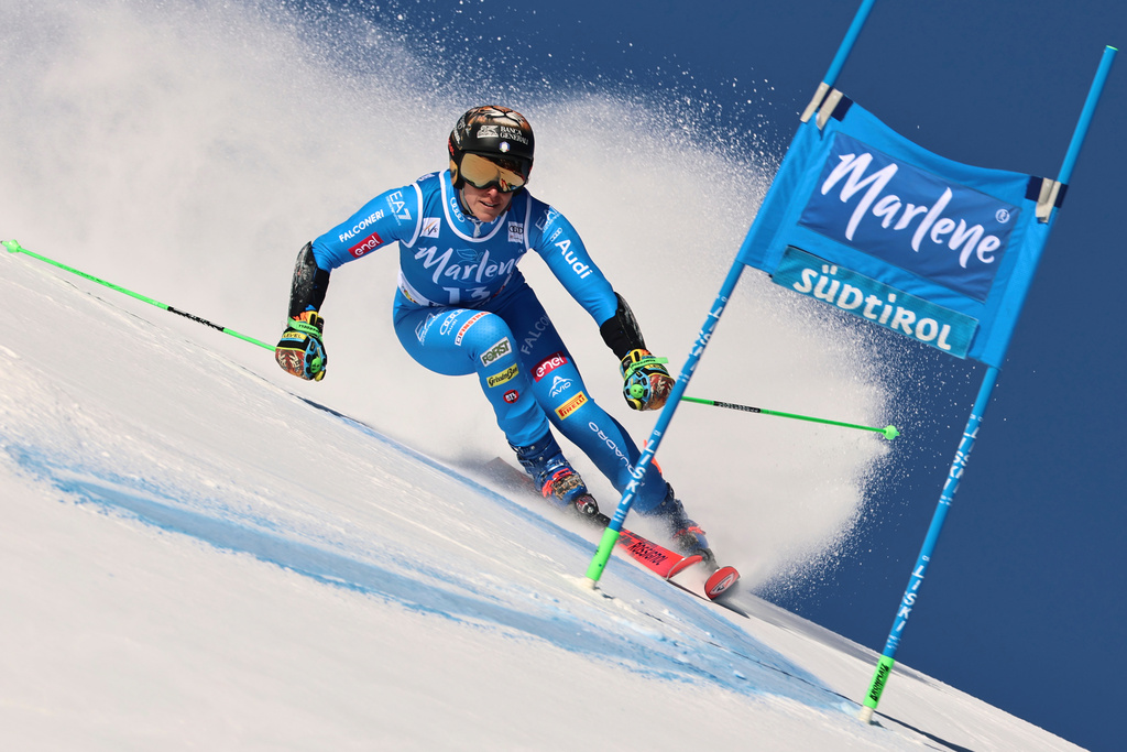 Italy's Federica Brignone speeds down the course during a women's World Cup giant slalom, in Kronplatz, Tuesday, Jan. 20, 2026. (AP Photo/Marco Trovati)