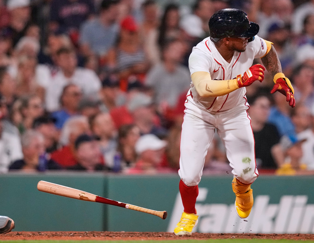 Boston Red Sox's Ceddanne Rafaela dashes down the first base line on his two RBI double during the sixth inning of a baseball game against the Chicago White Sox, Tuesday, Aug. 4, 2026, in Boston. (AP Photo/Charles Krupa)