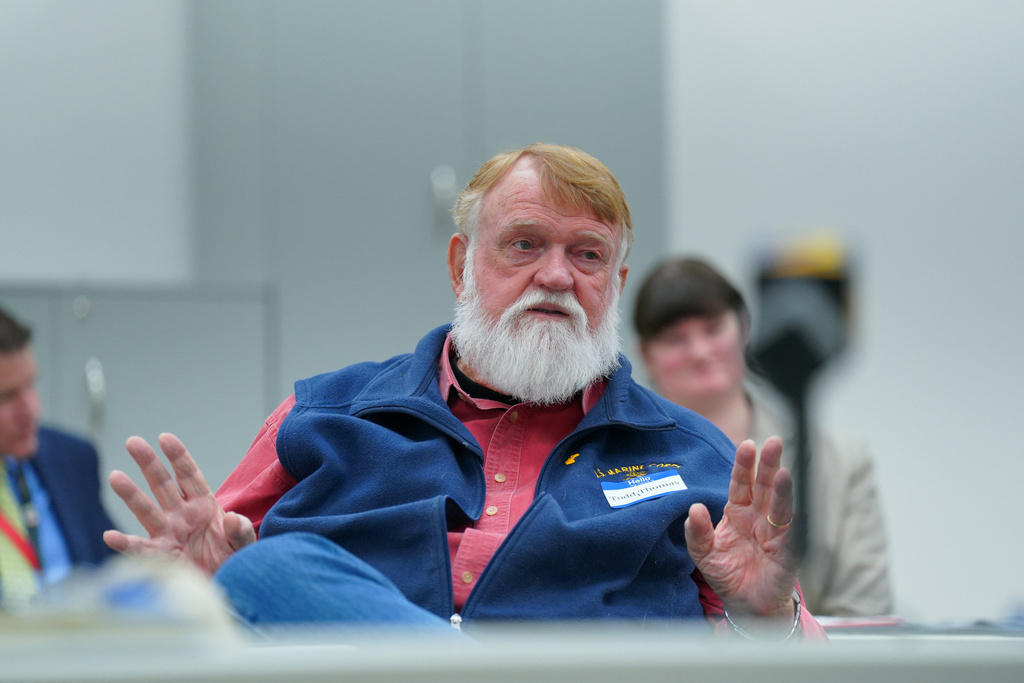 Thomas Todd shares how he invested with First Liberty Building and Loan during an event hosted by Georgia Secretary of State Brad Raffensperger, in Marietta, Ga., Monday, Feb. 9, 2026. (Matthew Pearson/WABE via AP)