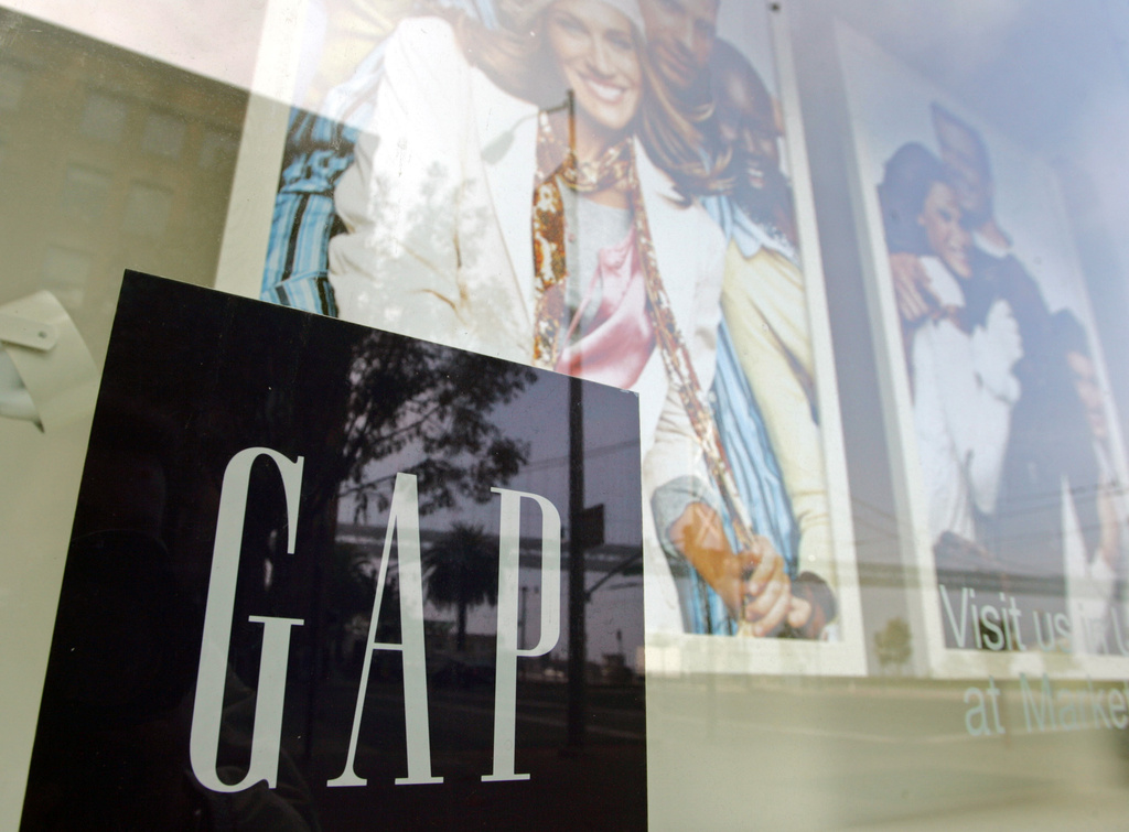 A window display shows current clothing styles at the headquarters of the Gap in San Francisco, Thursday, Nov. 18, 2004. (AP Photo/Eric Risberg,File)