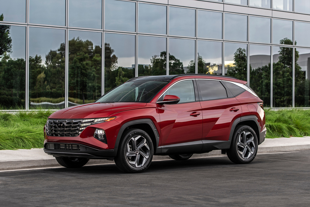 his photo provided by Hyundai shows the Tucson Hybrid, a compact SUV available used with a price tag under $25,000. (Courtesy of Hyundai Motor America via AP)