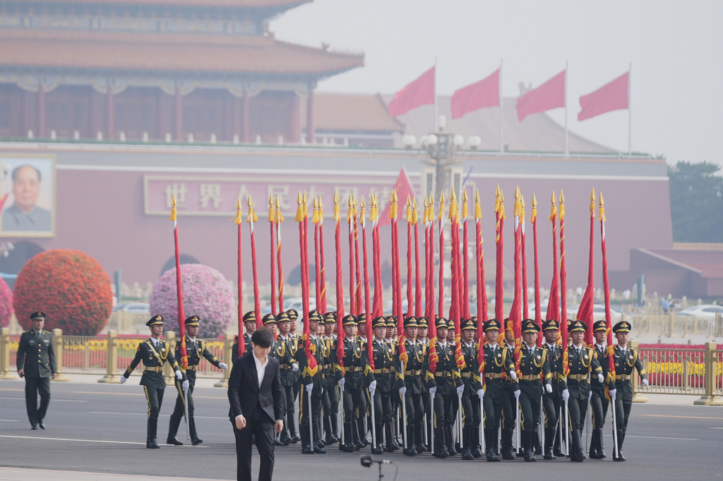 Members of the military rehearse before President Donald Trump is greeted by Chinese President Xi Jinping at a welcome ceremony at the Great Hall of the People, Thursday, May 14, 2026, in Beijing. (AP Photo/Mark Schiefelbein)