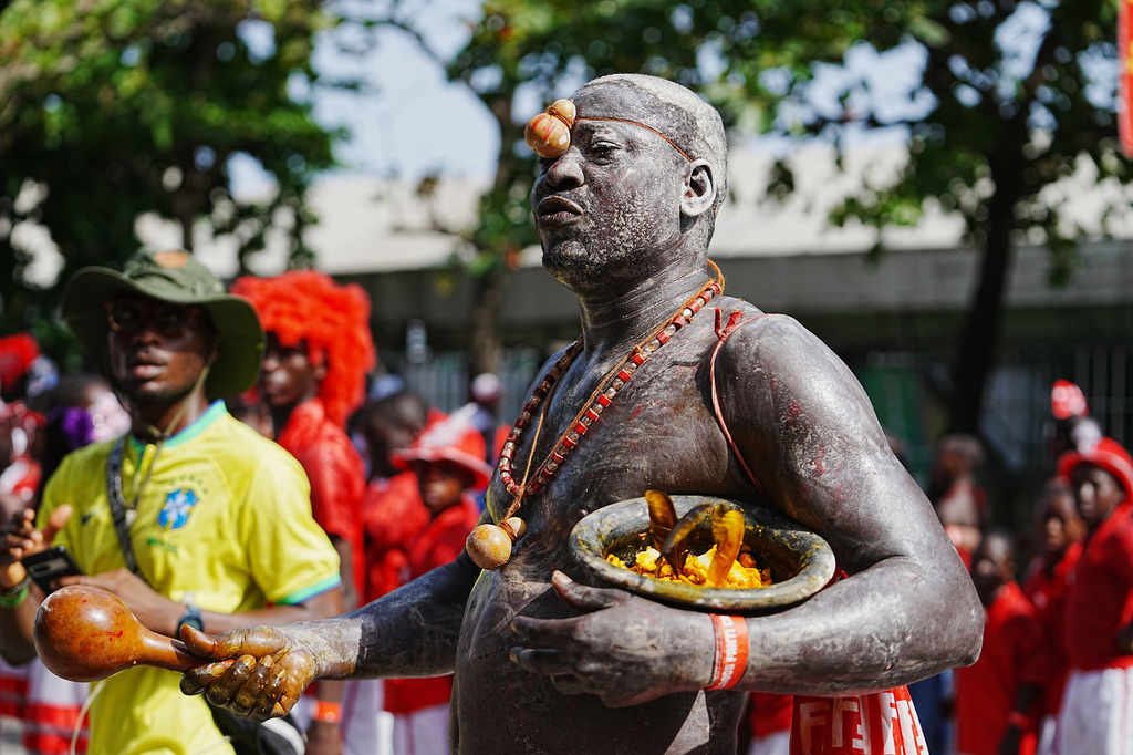 People dressed in costumes perform on the street during the Fanti Carnival in Lagos Nigeria, Monday, April 6, 2026, (AP Photo/Sunday Alamba)