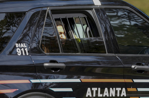 Derrick Groves, the last escapee from the New Orleans jailbreak in May, sits in a police vehicle after being taken into custody by U.S. Marshals and Atlanta police at a southwest Atlanta home, Wednesday, Oct. 8, 2025. (Ben Hendren/Atlanta Journal-Constitution via AP) Derrick Groves, the last escapee from the New Orleans jailbreak in May, sits in a police vehicle after being taken into custody by U.S. Marshals and Atlanta police at a southwest Atlanta home, Wednesday, Oct. 8, 2025. (Ben Hendren/Atlanta Journal-Constitution via AP)