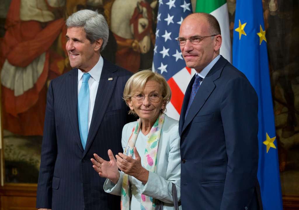 FILE - U.S. Secretary of State John Kerry, left, poses with Italian Foreign Minister Emma Bonino and Italian Premier Enrico Letta ,on the occasion of their meeting at Chigi Palace government office, in Rome, Wednesday, Oct. 23, 2013. (AP Photo/Andrew Medichini, File)
