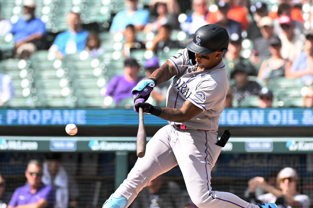 Colorado Rockies' Adael Amador hits a home run during the first inning of a baseball game against the Detroit Tigers, Sunday, Sept. 13, 2026, in Detroit. (AP Photo/Jose Juarez)