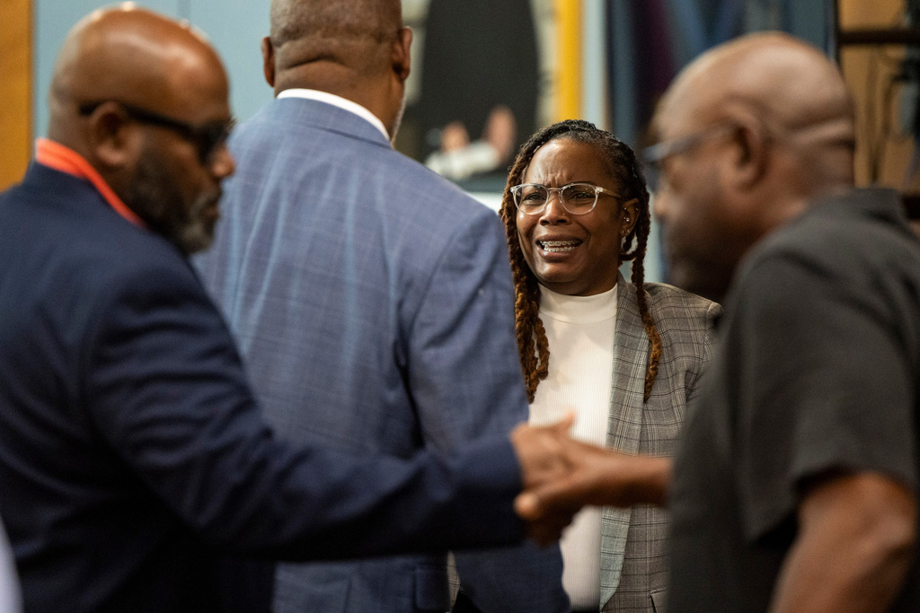Ebony Parker reacts after her trial on felony child neglect charges was dismissed at Newport News Circuit Court in Newport News, Va., Thursday, May 21, 2026. (Peter Casey/The Virginian-Pilot via AP, Pool)