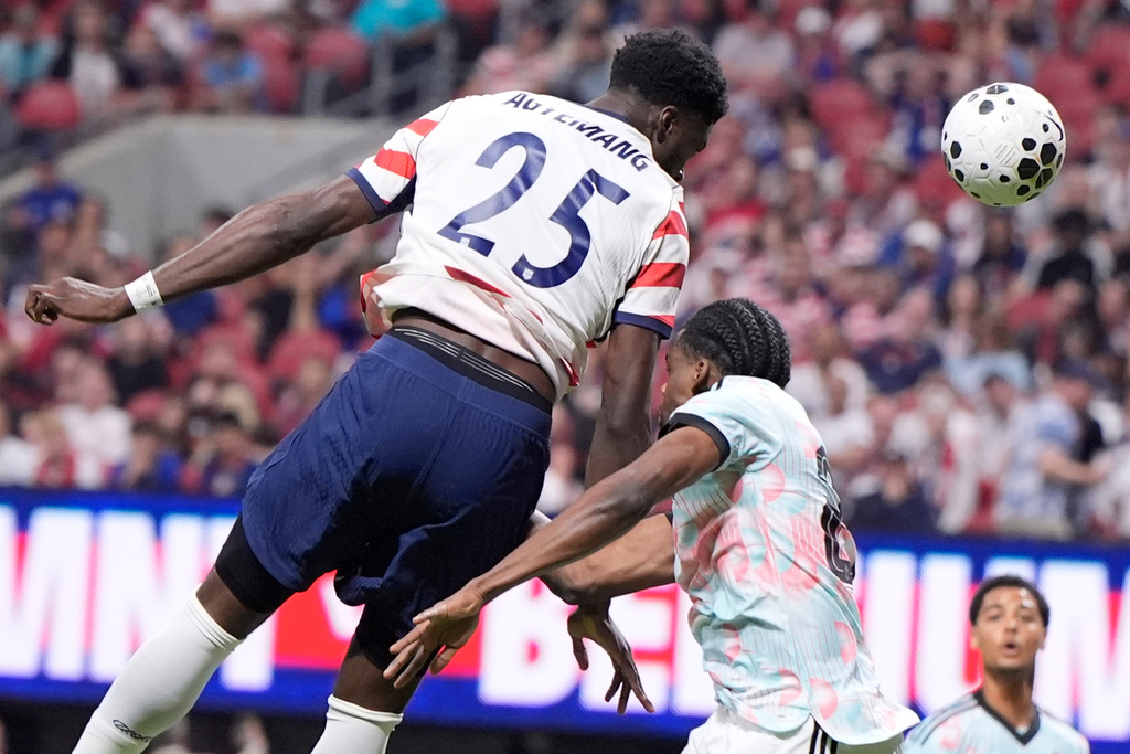 United States' Patrick Agyemang (25) heads the ball toat goal against Belgium during the second half of an international friendly soccer match, Saturday, March 28, 2026, in Atlanta. (AP Photo/Mike Stewart)