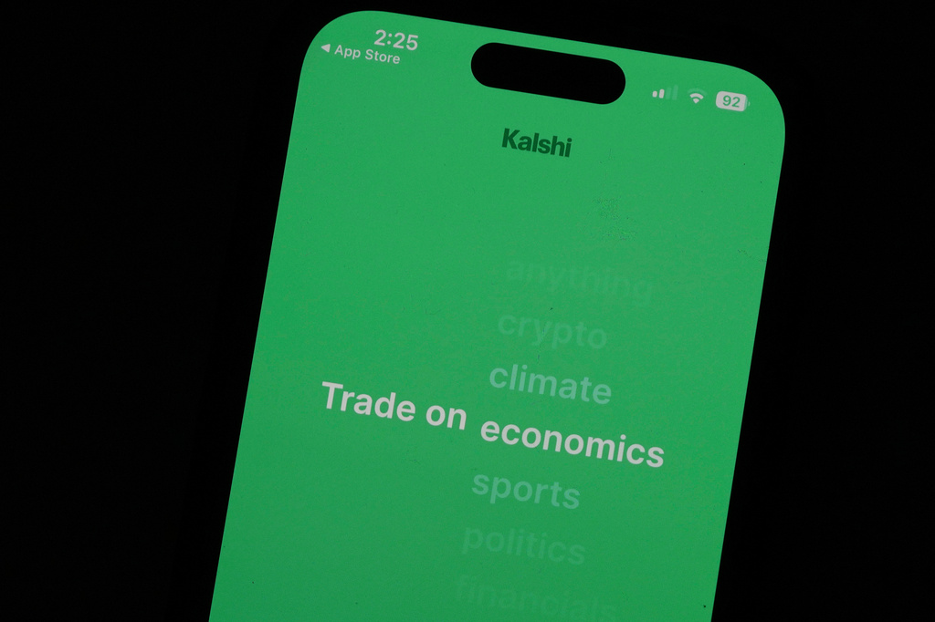 FILE - The prediction market app Kalshi is displayed on a mobile phone, April 16, 2026, in Chicago. (AP Photo/Erin Hooley, File)