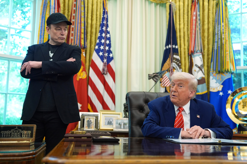 FILE - President Donald Trump, right, speaks during a news conference with Elon Musk in the Oval Office of the White House, May 30, 2025, in Washington. (AP Photo/Evan Vucci, File)