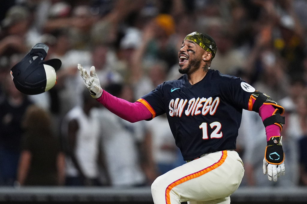 San Diego Padres' Luis Campusano celebrates with teammates after hitting a two-run, walk off home run during the tenth inning of a baseball game against the New York Yankees Friday, Sept. 4, 2026, in San Diego. (AP Photo/Gregory Bull)