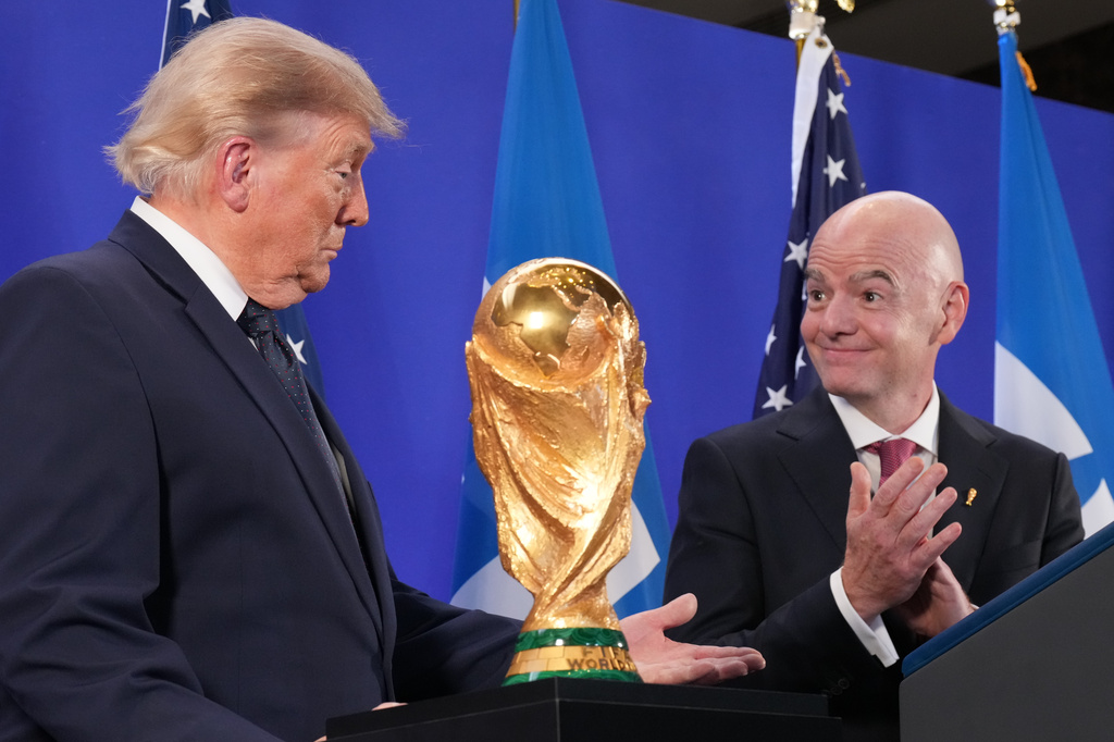 President Donald Trump speaks as FIFA President Gianni Infantino listens at a reception at Trump Tower in New York, Friday, July 17, 2026. (AP Photo/Jacquelyn Martin)