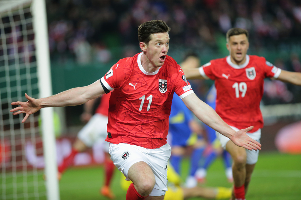 Austria's Michael Gregoritsch celebrates his side's equalizing goal during a group H World Cup qualifiying soccer match between Austria and Bosnia and Herzegovina in Vienna, Austria, Tuesday, Nov. 18, 2025. (AP Photo/Heinz-Peter Bader)