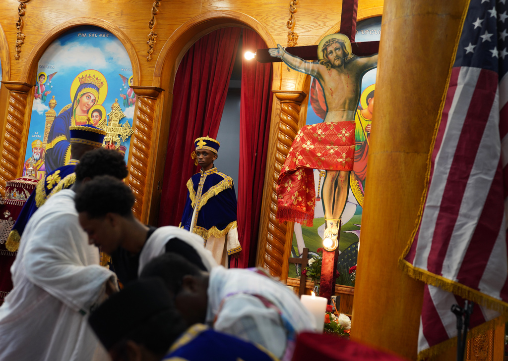 Deacons celebrate Good Friday at Re'ese Adbarat Debre Selam Kidist Mariam Church, an Ethiopian Orthodox Tewahedo church, in Washington, Friday, April 10, 2026. (AP Photo/Jessie Wardarski)