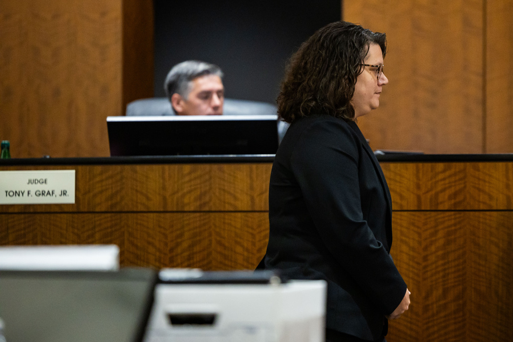 Caitlin Oliver, forensic biologist with the Bureau of Alcohol, Tobacco, Firearms, and Explosives, walks up to testify during a preliminary hearing for Tyler Robinson, the Utah man accused of fatally shooting Charlie Kirk, at the 4th District Court in Provo, Utah, Friday, July 10, 2026. (Tess Crowley/The Deseret News via AP, Pool)