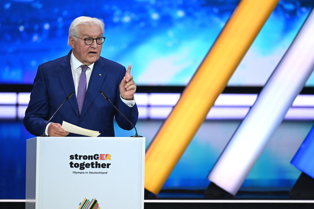 Germany's President Frank-Walter Steinmeier speaks at the extraordinary DOSB General Assembly to select Germany's Olympic bid for 2036, 2040, or 2044 in Baden-Baden, Germany, Saturday Sept. 26, 2026. (Marijan Murat/dpa via AP)