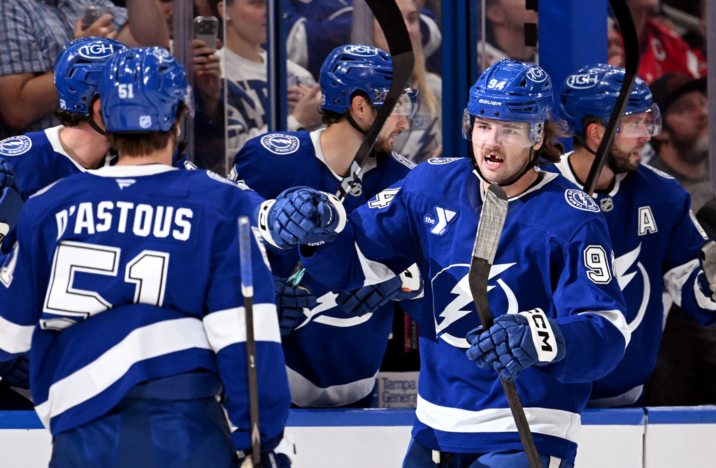 Tampa Bay Lightning center Conor Geekie (94) celebrates after his first period goal during an NHL hockey game against the Washington Capitals, Saturday, Oct. 3, 2026, in Tampa, Fla. (AP Photo/Jason Behnken)