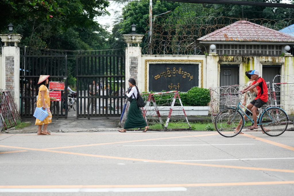 Pedestrians walk past entrance of Insein prison Tuesday, Sept. 15, 2026, in Yangon, Myanmar. (AP Photo)