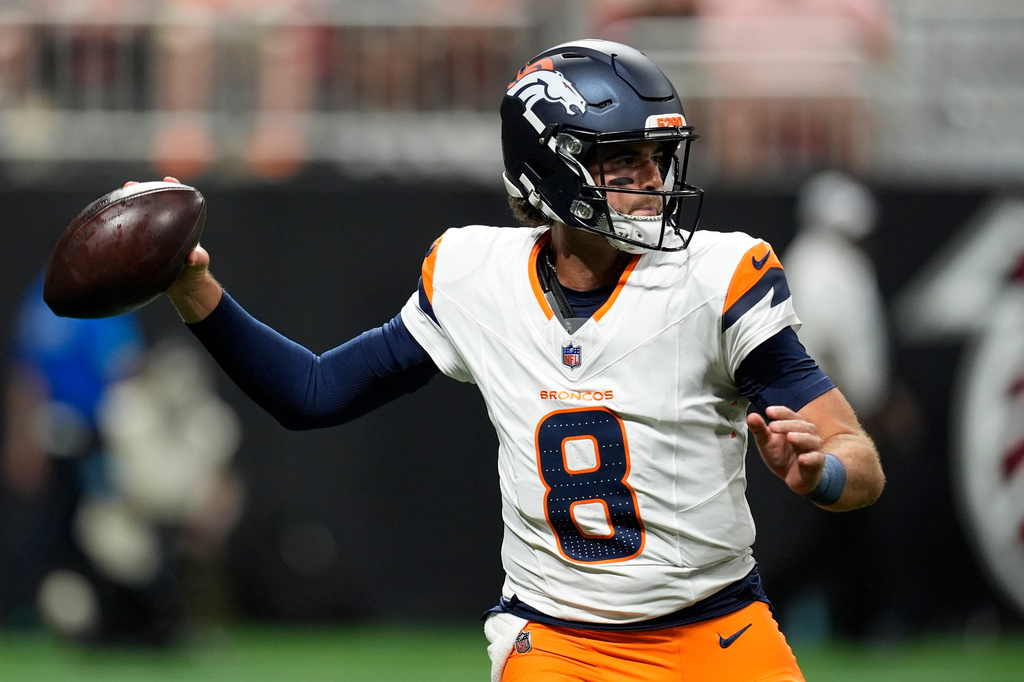 Denver Broncos quarterback Jarrett Stidham (8) passes during the first half of a preseason NFL football game, Friday, Aug. 14, 2026, in Atlanta. (AP Photo/Mike Stewart)