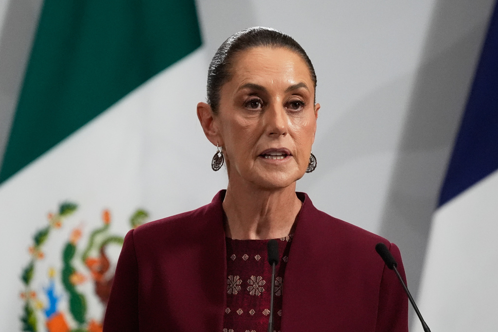 Mexican President Claudia Sheinbaum giveS a joint news conference with France's President Emmanuel Macron at the National Palace in Mexico City, Friday, Nov. 7, 2025. (AP Photo/Marco Ugarte)