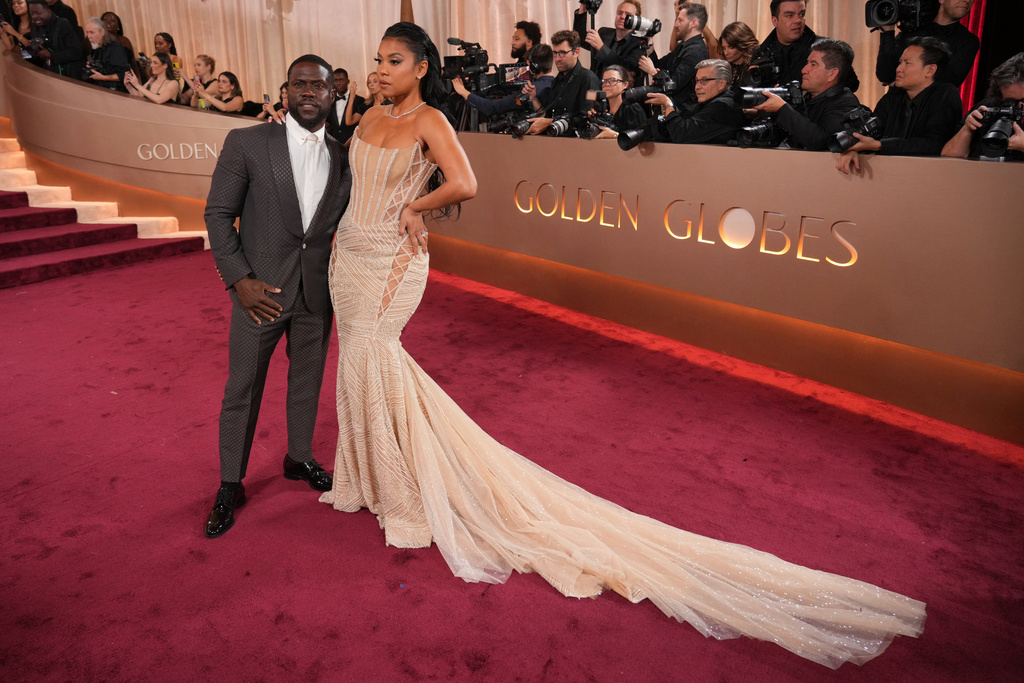 Kevin Hart, left, and Eniko Hart arrive at the 83rd Golden Globes on Sunday, Jan. 11, 2026, at the Beverly Hilton in Beverly Hills, Calif. (Photo by Jordan Strauss/Invision/AP)